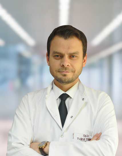 Portrait of Dr. M.D. Tuğrul TÜRKER, a medical professional providing expert, patient-centered and compassionate healthcare services.