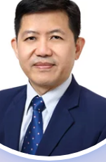 Dr. Ekkit Surakarn providing professional medical consultation and patient-focused healthcare services.